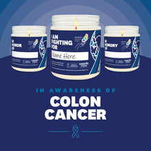 Load image into Gallery viewer, Colon Cancer Awareness soy candle in a 9 oz glass jar, in collaboration with GRACE, from Angela Rose Studios. Choose from three messages: "I Am Fighting For," "In Honor Of," or "In Memory Of," and personalize it with the name of your loved one. Each candle supports cancer patients, with 100% of proceeds donated to Greater Richland Area Cancer Elimination, Inc.