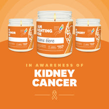 Load image into Gallery viewer, Kidney Cancer Awareness soy candle in a 9 oz glass jar, in collaboration with GRACE, from Angela Rose Studios. Choose from three messages: "I Am Fighting For," "In Honor Of," or "In Memory Of," and personalize it with the name of your loved one. Each candle supports cancer patients, with 100% of proceeds donated to Greater Richland Area Cancer Elimination, Inc.