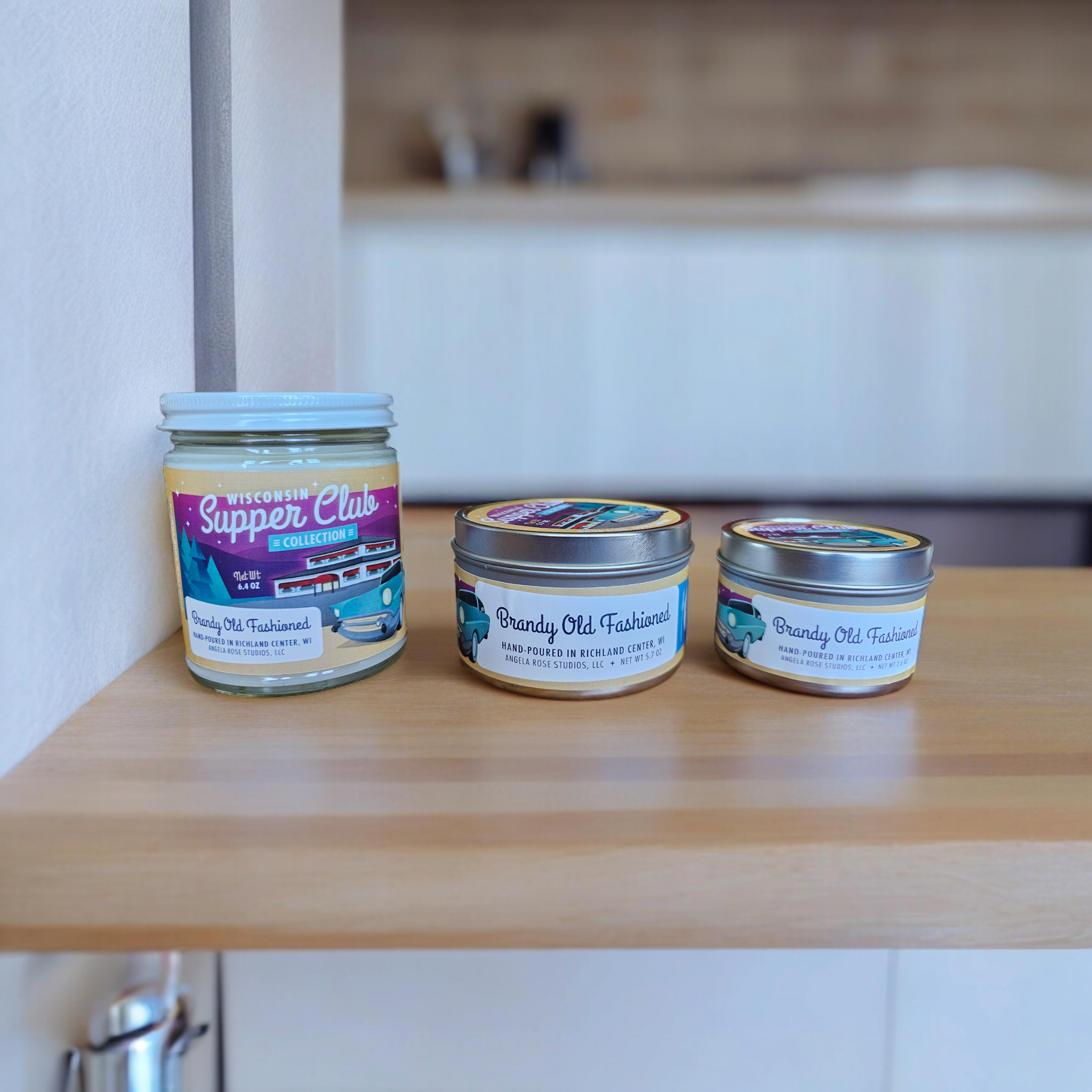 Three sizes of candles to show as a comparison. Candles on the kitchen counter