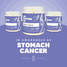 Load image into Gallery viewer, Stomach Cancer Awareness soy candle in a 9 oz glass jar, in collaboration with GRACE, from Angela Rose Studios. Choose from three messages: "I Am Fighting For," "In Honor Of," or "In Memory Of," and personalize it with the name of your loved one. Each candle supports cancer patients, with 100% of proceeds donated to Greater Richland Area Cancer Elimination, Inc.