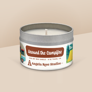 Around the Campfire soy candle in a 8 oz travel tin, from the Wisconsin Camping Collection by Angela Rose Studios.