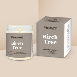 Birch Tree soy candle in a 9 oz glass jar with packaging box, from the Signature Collection by Angela Rose Studios.