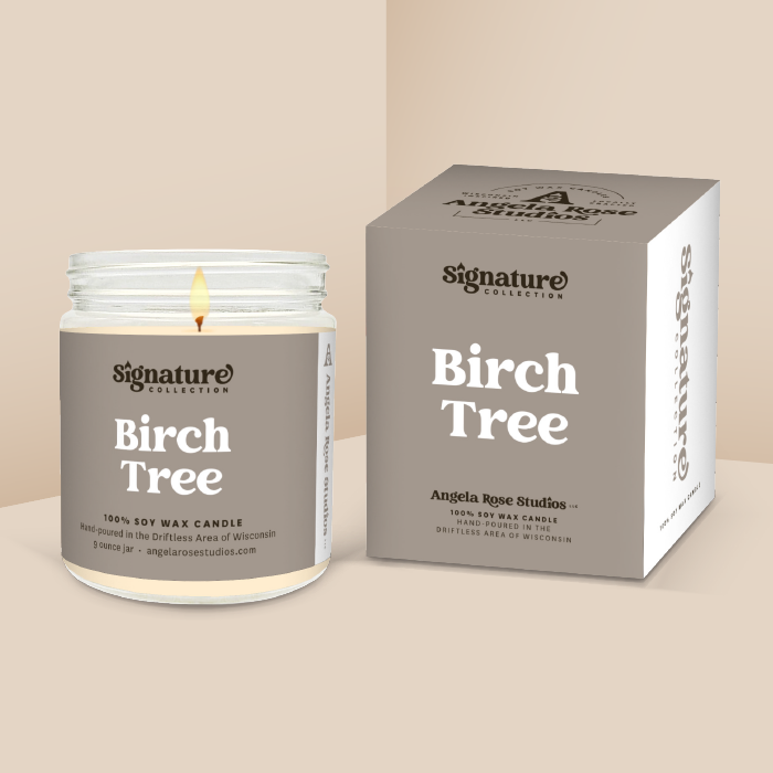 Birch Tree soy candle in a 9 oz glass jar with packaging box, from the Signature Collection by Angela Rose Studios.