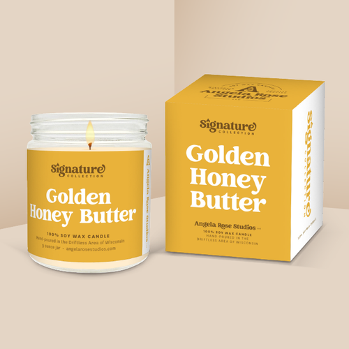 Golden Honey Butter soy candle in a 9 oz glass jar with packaging box, from the Signature Collection by Angela Rose Studios.