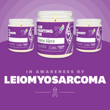 Load image into Gallery viewer, Leiomyosarcoma Awareness soy candle in a 9 oz glass jar, in collaboration with GRACE, from Angela Rose Studios. Choose from three messages: &quot;I Am Fighting For,&quot; &quot;In Honor Of,&quot; or &quot;In Memory Of,&quot; and personalize it with the name of your loved one. Each candle supports cancer patients, with 100% of proceeds donated to Greater Richland Area Cancer Elimination, Inc.