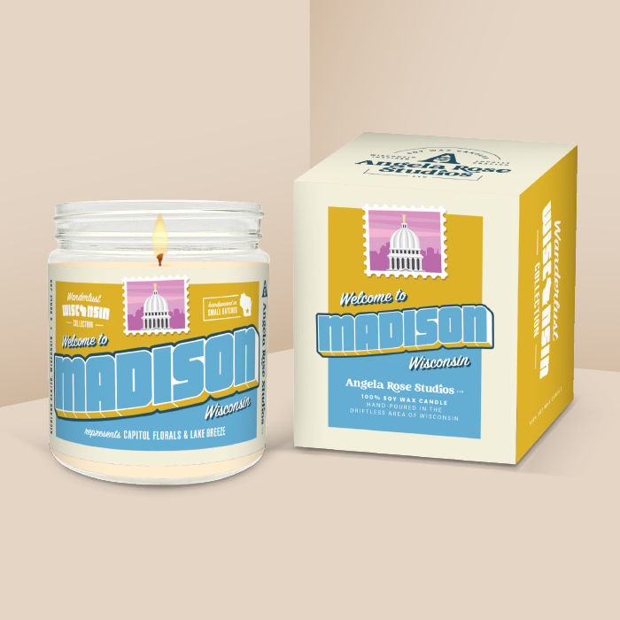 Madison soy candle in a 9 oz glass jar with packaging box, from the Wanderlust Wisconsin Collection by Angela Rose Studios.