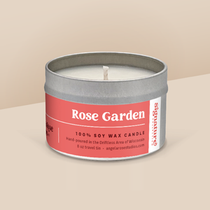 Rose Garden soy candle in a 8 oz travel tin, from the Signature Collection by Angela Rose Studios.