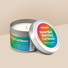 Load image into Gallery viewer, Saturday Morning Cartoons soy candle in a 4 oz travel tin, from the Signature Collection by Angela Rose Studios.