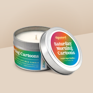 Saturday Morning Cartoons soy candle in a 4 oz travel tin, from the Signature Collection by Angela Rose Studios.