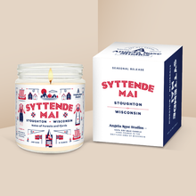 Load image into Gallery viewer, Syttende Mai soy candle in a 9 oz glass jar with packaging box, an exclusive seasonal release by Angela Rose Studios.