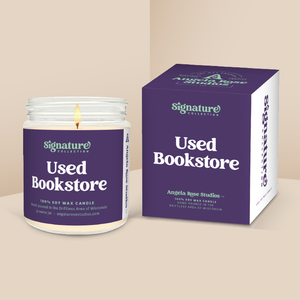 Used Bookstore soy candle in a 9 oz glass jar with packaging box, from the Signature Collection by Angela Rose Studios.